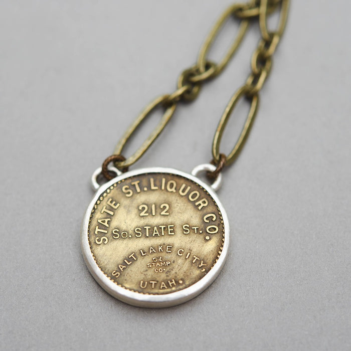 Utah State Liquor Store Vintage Token Necklace